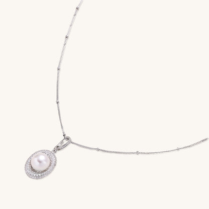 Sterling silver necklace with freshwater pearl in sparkling crystal halo pendant on delicate beaded chain