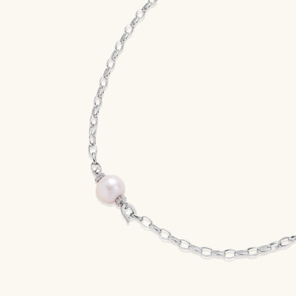Sterling silver chain necklace with single white freshwater pearl centerpiece on neutral background, 445mm length.