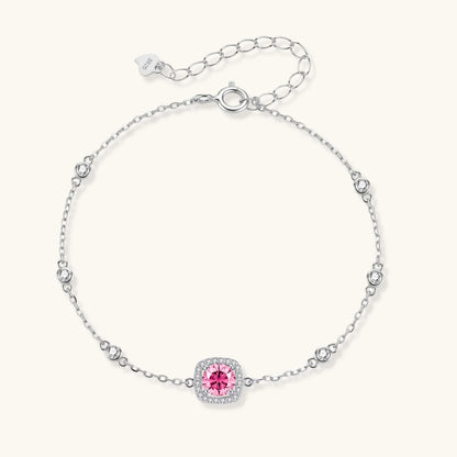 Elegant sterling silver chain bracelet featuring pink moissanite center stone in cushion halo setting with adjustable clasp